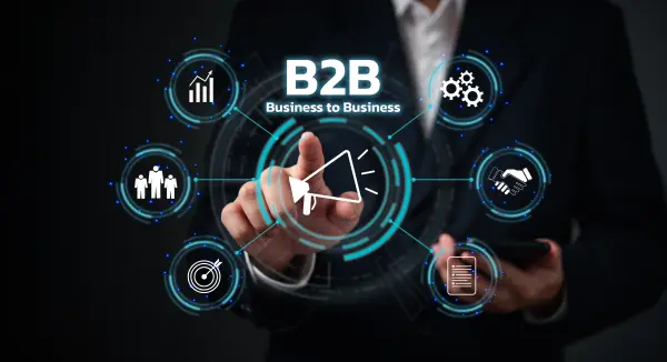 Conceito de B2B com duas mãos se cumprimentando sobre um fundo de engrenagens e conexões digitais, simbolizando a parceria entre empresas.